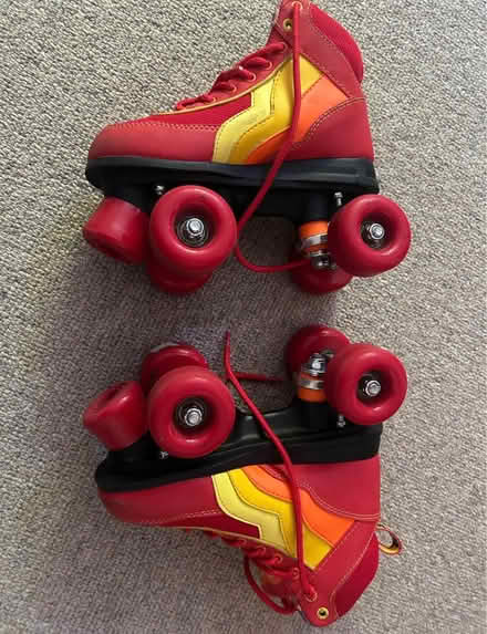 Photo of free Size 1 red roller skates (Headington OX3) #1
