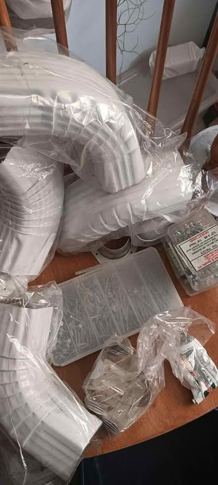 Photo of free misc drain pipe ends braces screws (melrose) #1