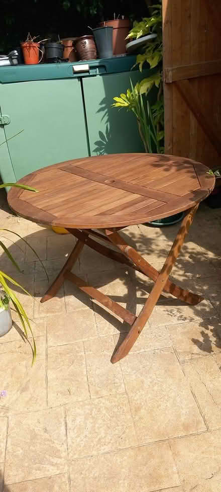 Photo of free Wooden Patio Table (Rochestown) #1