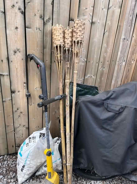 Photo of free 3 tiki torches and weed whacker (Parliament/Queen) #1