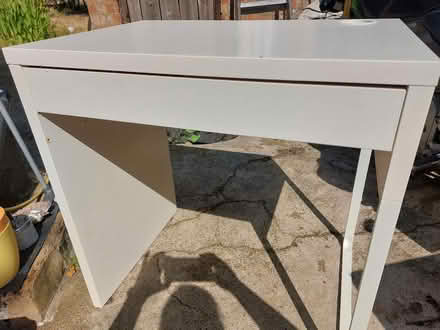 Photo of free Small white desk small cuts on top (Whitton TW3) #1