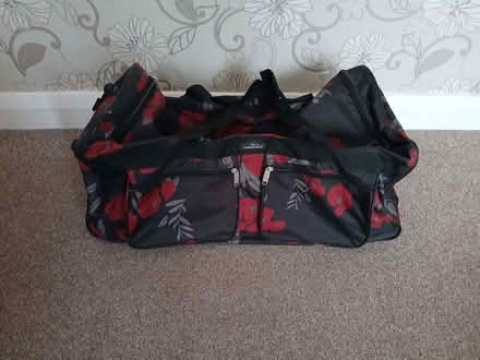 Photo of free Black travel holdall with wheels (Sale M33) #1