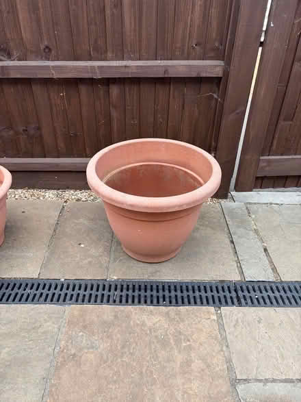 Photo of free Large plastic terracotta coloured pot approx 40cm (Poplars SG2) #1
