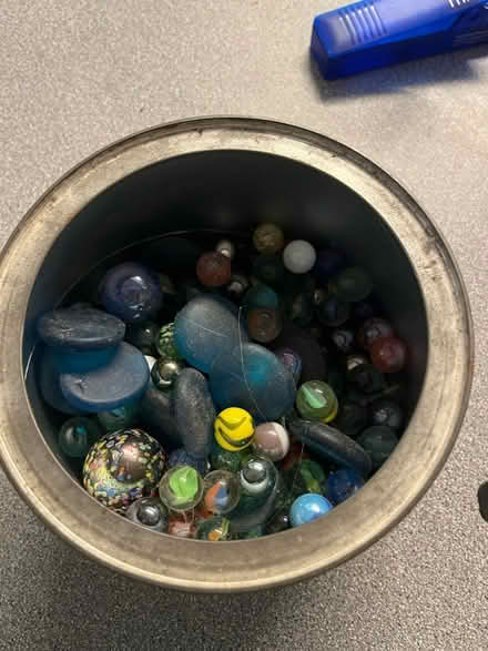 Photo of free Tub of about 50 marbles and some glass beads (Stretford M32) #1
