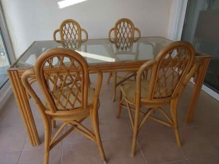 Photo of free Conservatory rattan glass topped table and 4 chairs (Grange Park WA10) #1