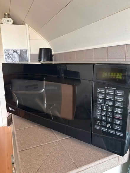 Photo of free Black GE Microwave (East Queen Anne, Seattle) #2