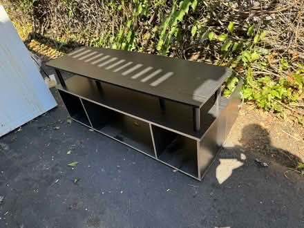 Photo of free Wooden TV stand w shelves (1075 Valencia Avenue) #2
