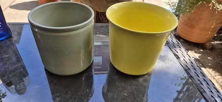 Photo of free 2 x indoor plant pot holders, pale Green and Yellow (St Helier SM4) #1