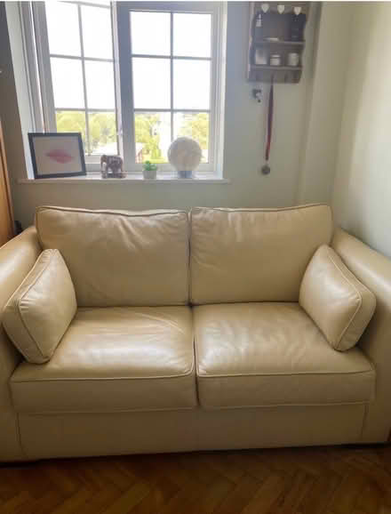 Photo of free Cream leather pull out sofabed (Becontree RM9) #1