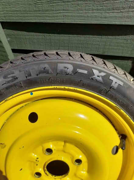 Photo of free Spare tyre 115/70 yellow (Herringthorpe S65) #2