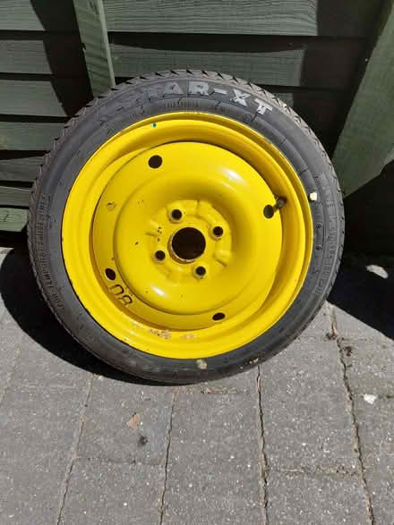 Photo of free Spare tyre 115/70 yellow (Herringthorpe S65) #1