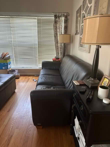 Photo of free Dark brown leather Natuzzi couch (Red Rock, Leesburg, VA 20176) #1