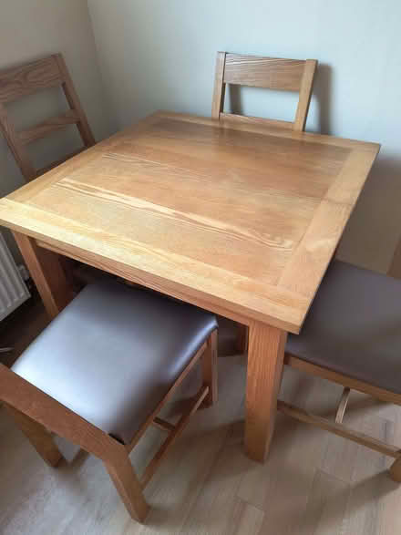 Photo of free Light oak table and four chairs (Bolton le Sands LA5) #1