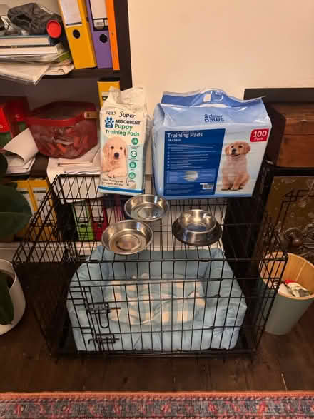 Photo of free Puppy training pads, bowls/ crate (Headington OX3) #1