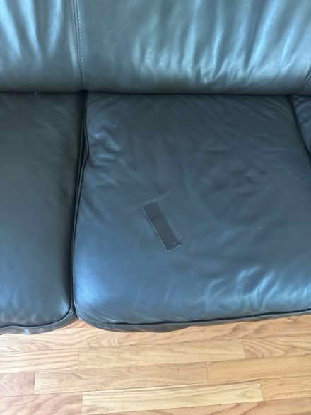 Photo of free Dark brown leather Natuzzi couch (Red Rock, Leesburg, VA 20176) #2