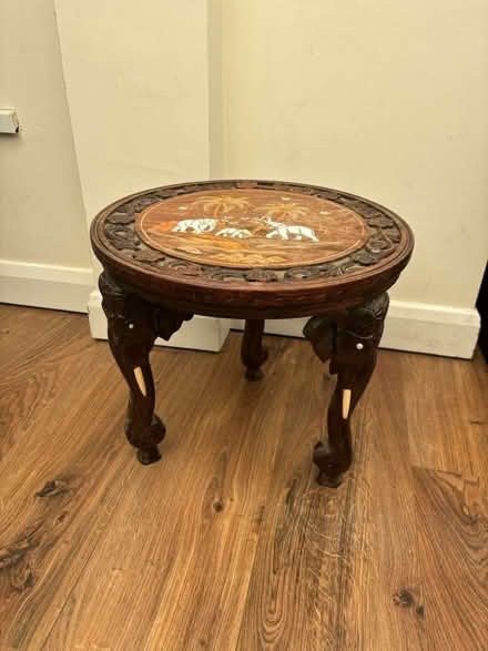 Photo of free Small carved wooden table with elephant legs (Walton-on-Thames KT12) #1