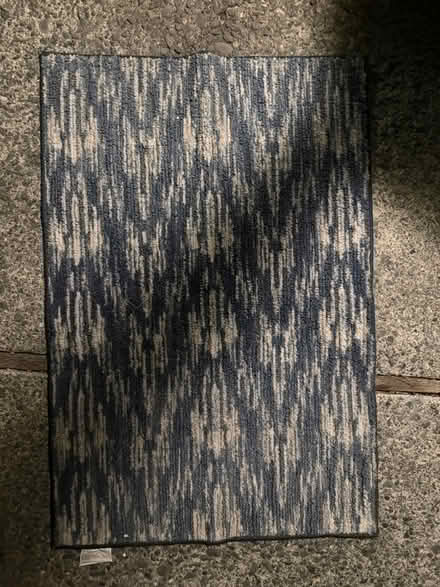 Photo of free 30” x 45” Rug w rubber backing (1075 Valencia Avenue) #1