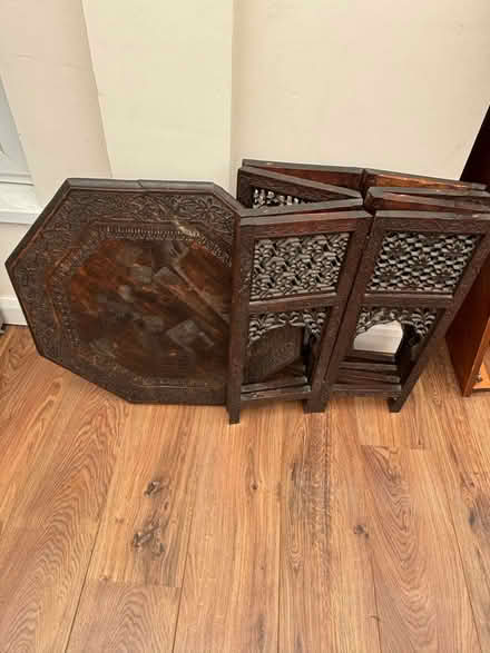 Photo of free Dark brown wooden carved octagonal table collapsible (Walton-on-Thames KT12) #3