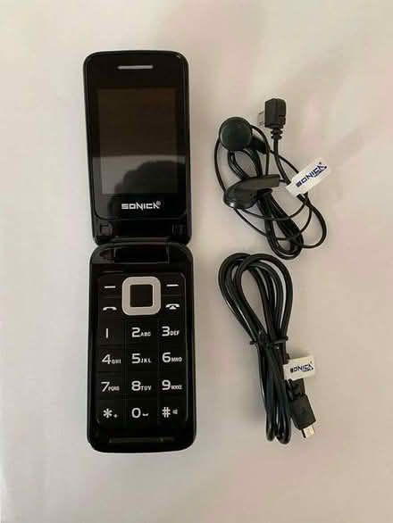 Photo of earphones and manual for Sonica flip phone (Durkar WF4) #1