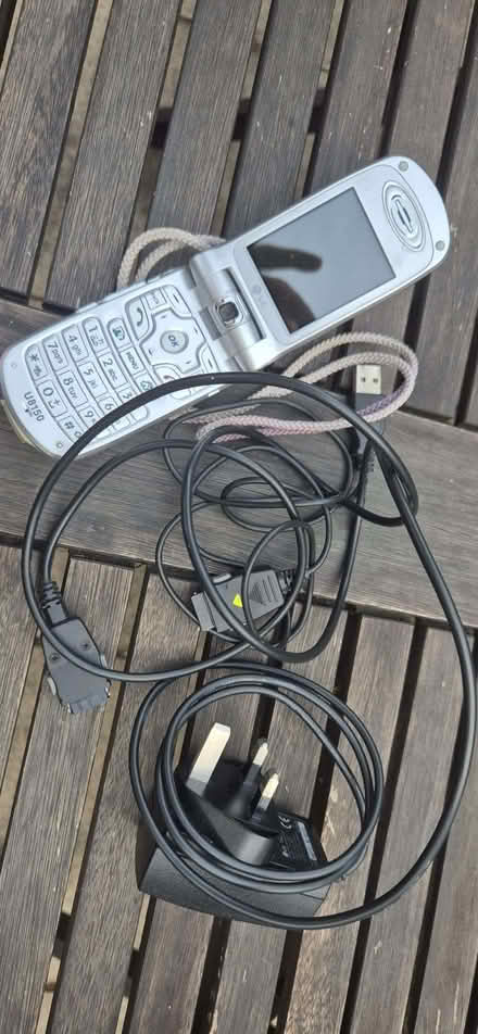 Photo of free Lg flip phone with charger and data cable (Stirchley B30) #1
