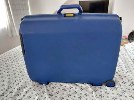 Photo of free Medium samsonite suitcase (Po16) #1