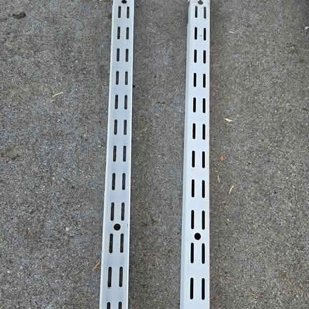 Photo of free 2 Metal shelf holding things (94041) #1