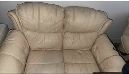 Photo of free Cream leather two seater sofas and footstall (Rochford SS4) #1