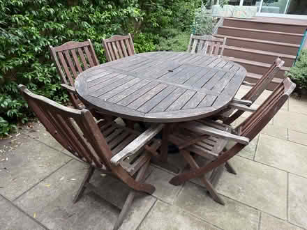 Photo of free Garden Furniture: Sturdy wooden extendible table & 6 chairs (Walham Green SW6) #1
