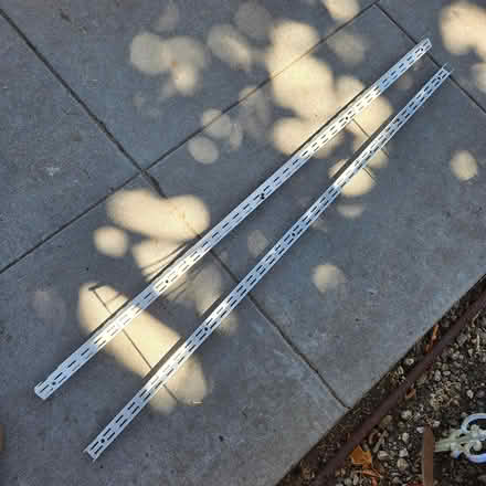 Photo of free 2 Metal shelf holding things (94041) #2