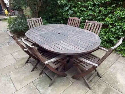 Photo of free Garden Furniture: Sturdy wooden extendible table & 6 chairs (Walham Green SW6) #2