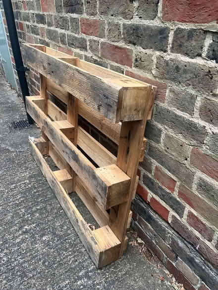 Photo of free Wooden pallet (Reigate RH2) #1