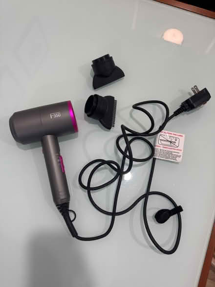 Photo of free Hairdryer with styling accessories (Olney) #1