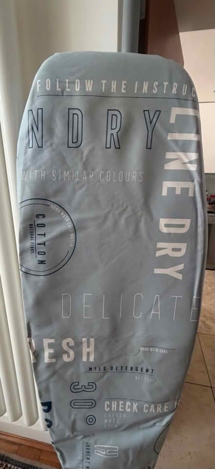Photo of free Ironing board - wide and long with wheels. Missing pin (West Kensington W14) #1