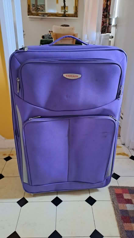 Photo of free Big purple suitcase. 70x25x42cms (Sherrard's Green WR14) #1