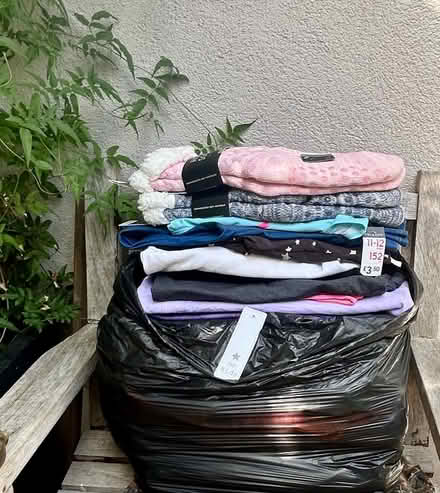 Photo of free One bin bag full of clothes (TW2 whitton) #1