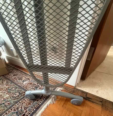 Photo of free Ironing board - wide and long with wheels. Missing pin (West Kensington W14) #4