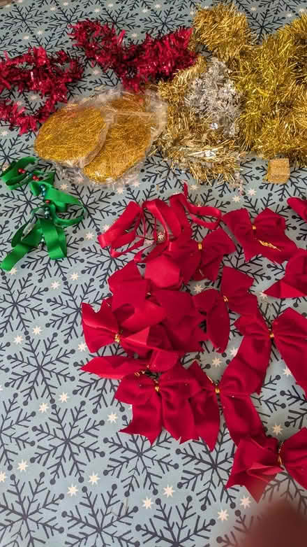 Photo of free Red bows and scraps of tinsel (Welwyn Garden City AL8) #2