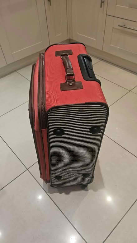 Photo of free Large Isaacs Mizrahi suit case (Southwater RH13) #1