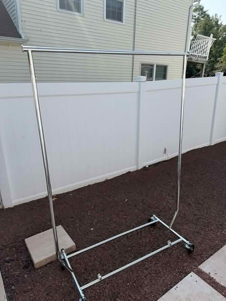Photo of free Three Wheeled Clothing Racks (08816) #1