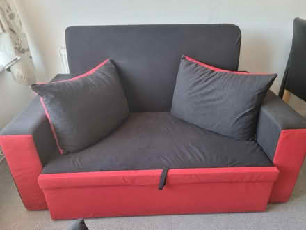 Photo of free Two seater sofa bed with two pillows (Thamesmead SE28) #1