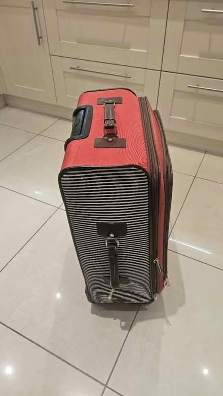 Photo of free Large Isaacs Mizrahi suit case (Southwater RH13) #2