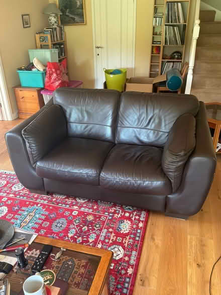 Photo of free Two-seater leather sofa (Lower Street NR11) #1