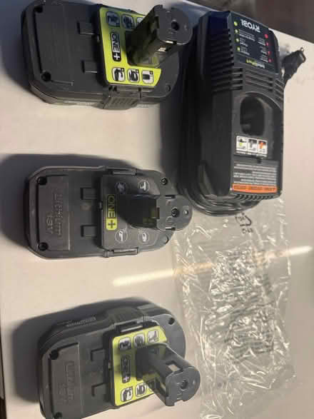 Photo of free Three Ryobi 18v batteries & charger (West Loop) #1