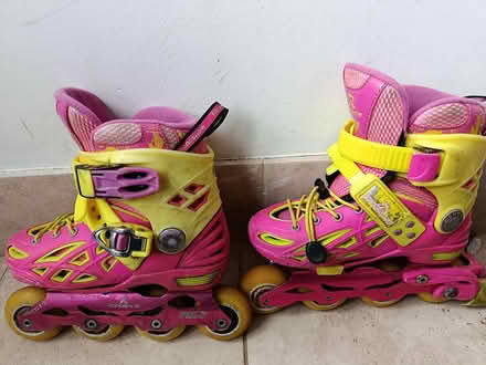 Photo of free Kids adjustable roller blades 28-31 (Woking GU22) #1
