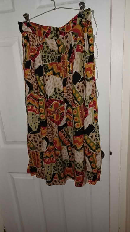 Photo of free Woman's skit and jacket combo (near Britannia Plaza) #1