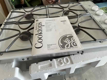 Photo of free 30” White GE profile gas cooktop (Minden. NV) #1
