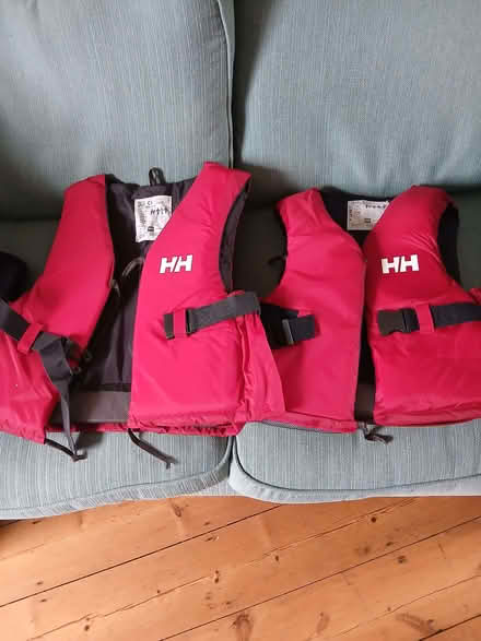 Photo of free 2medium lifejackets and 2 pairs of water shoes (Leckhampton GL53) #1