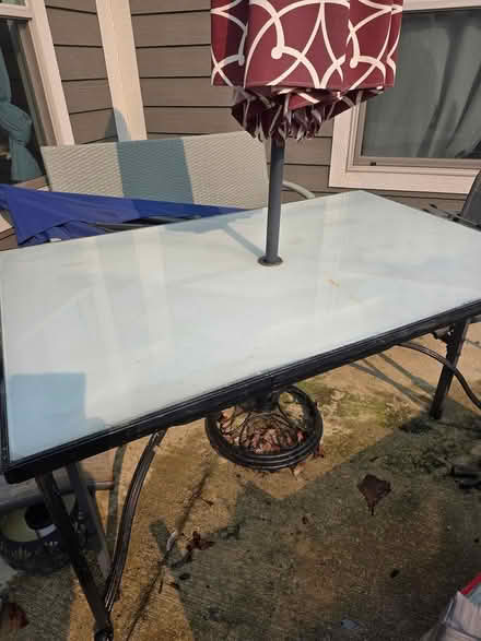 Photo of free Glass top patio table with umbrella (Grove City) #2