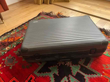 Photo of free Large hard shell suitcase #2 (Ibrox G51) #1