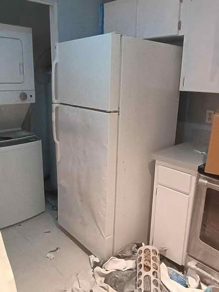 Photo of free White GE fridge (Carrollwood) #1
